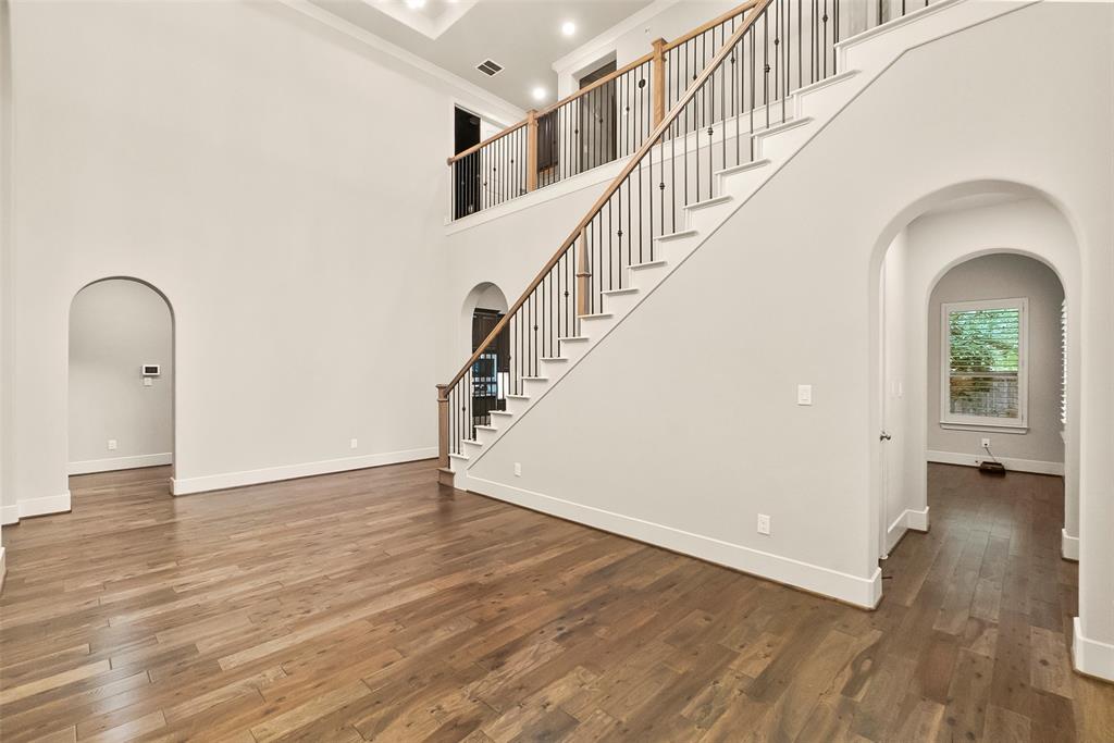 Soaring ceilings and recessed lights throughout.