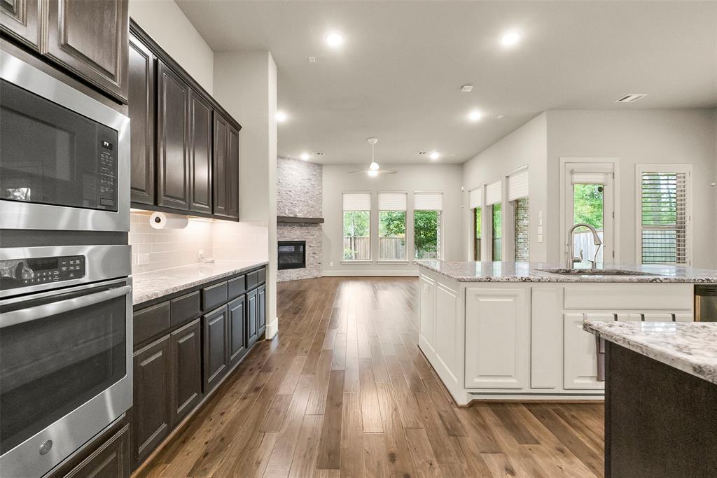 So much cabinet and counter space in this open concept kitchen.