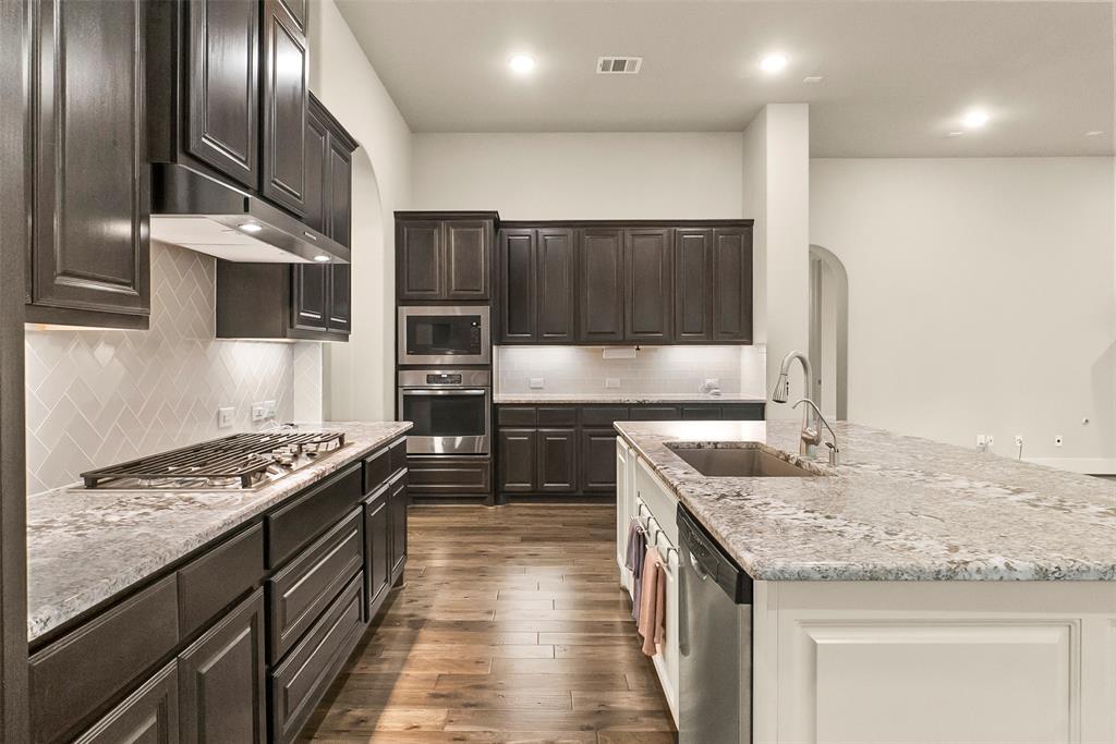 Custom sink and granite counters. A chef's delight!