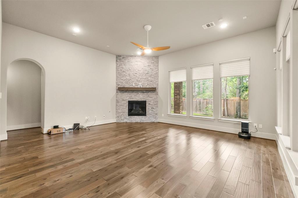 Living room with motorized shades.