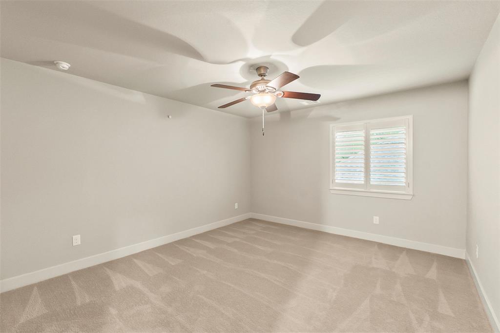 Upstairs bedroom has an ensuite bathroom.