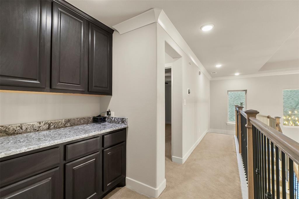 A great nook to set up your movie collection or refreshments for the media room.