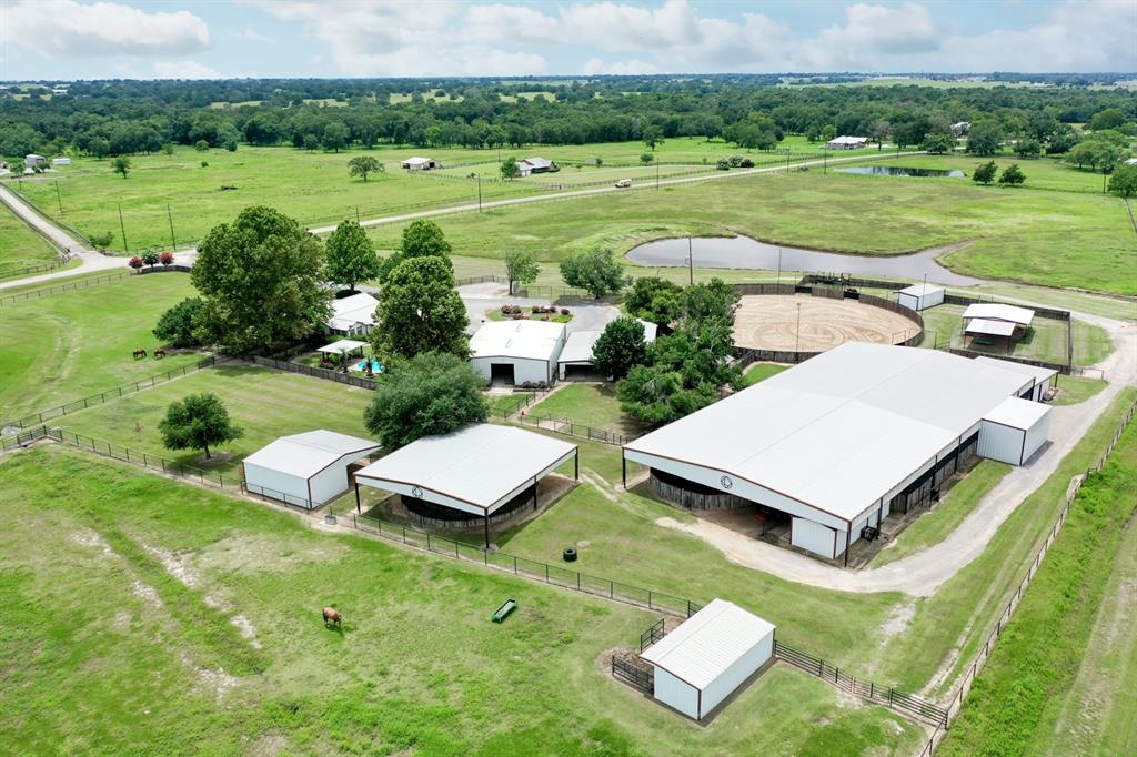 A horse lover's dream!! An ideal 2000 + sqft ranch-style home, pool and pool pavilion perfectly complement this 24 acres. Enjoy everything needed to unload, saddle up, and get started!! What more could you want!

A few of the many property highlights include but are not limited to a 40'x60' Main Barn w (5) 12'x12' stalls, 20'x40' Foaling Barn w (2) 16'x16' stalls, 50'x50' covered walker, 80'x120' Covered Arena w (2) BigAss Fans and watering system, 40' covered breaking pen, 150' round pen w watering system and great sandy soil. Two hay barns w concrete floors. So many various outbuildings one must truly see to believe! Easy access to I-45 with convenient proximity to Dallas, Fort Worth, and Houston. Less than a mile from a state-of-the-art horse rehabilitation center. The entire property is gated, fenced, and cross-fenced with 2 7/8" pipe, no climb horse wire in (4) pastures w loafing sheds. Excellent facility for breeding, training, or boarding!