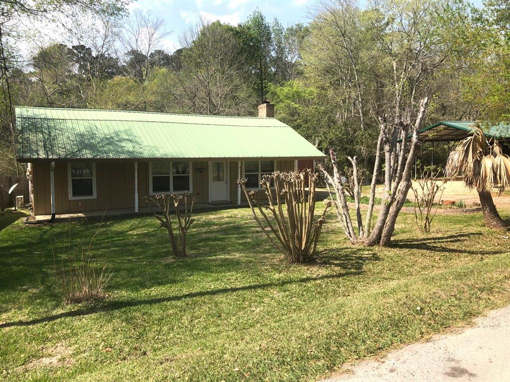 61  Happiness Hollow Coldspring Texas 77331, 64