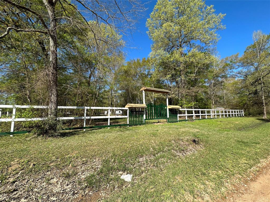 Two entrances for this property. Oak Forest Drive side.