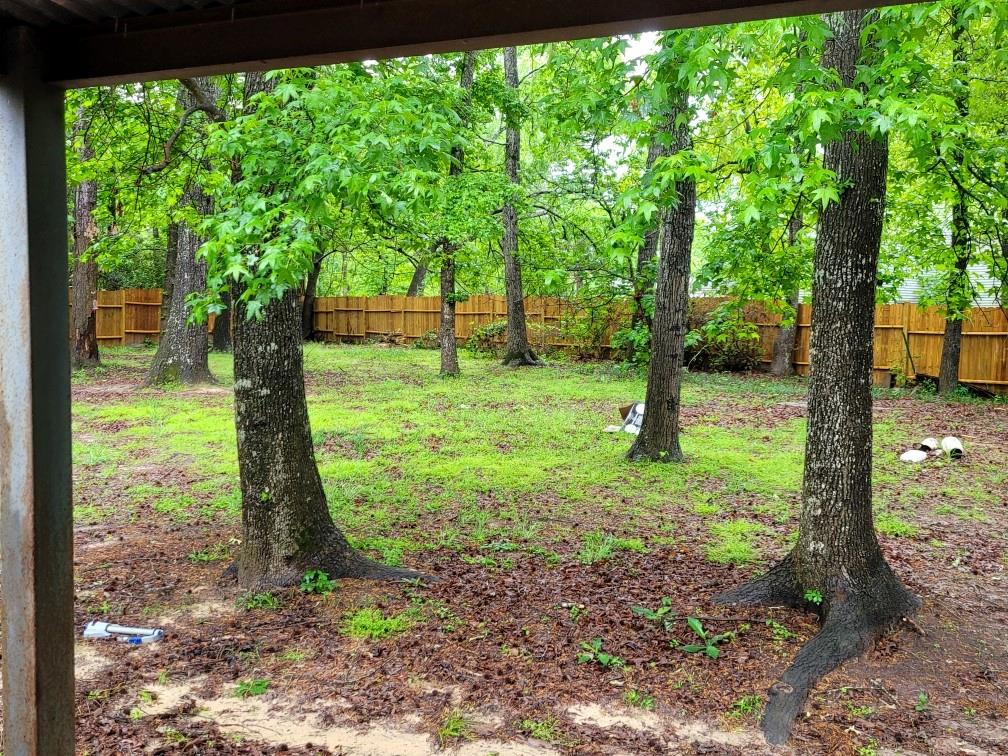 Large fenced in back yard for privacy and or the family pets.