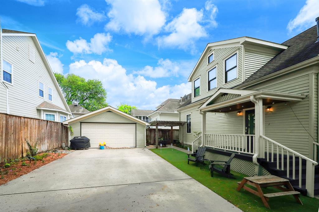 The full size two car garage currently serves as storage and a home office.  The double wide driveway with an automatic gate provides secure vehicle parking.