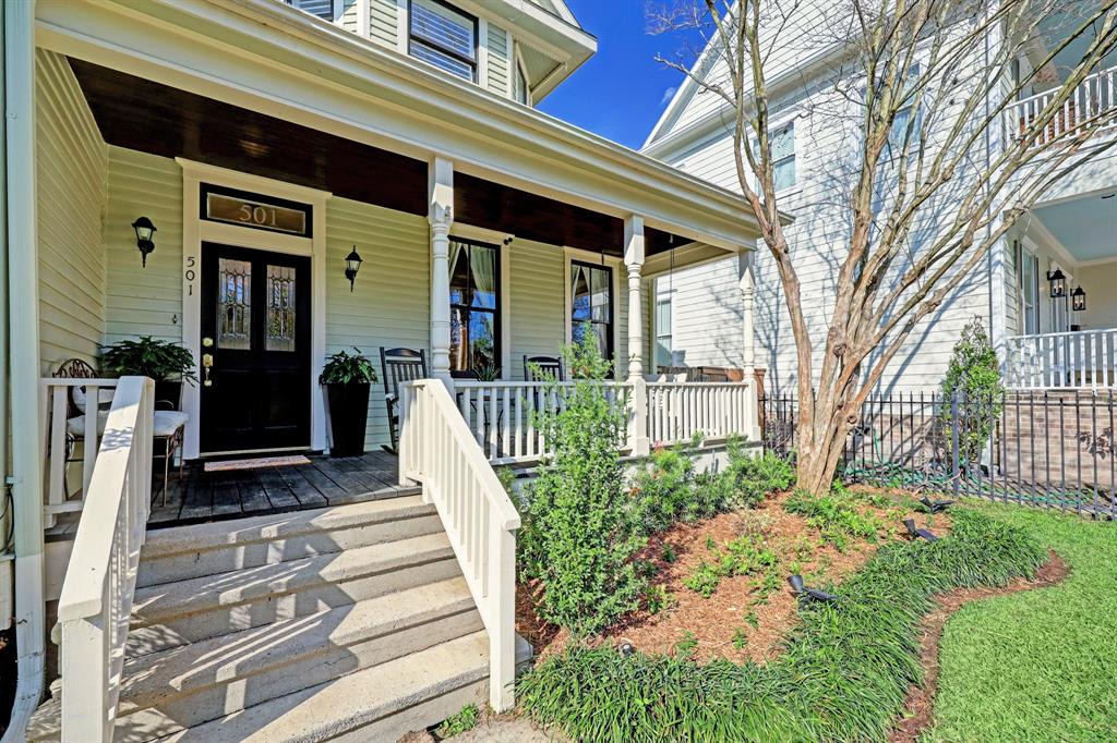 In addition to excellent yard space this home offers a classic covered front porch with a swing and room for additional seating.