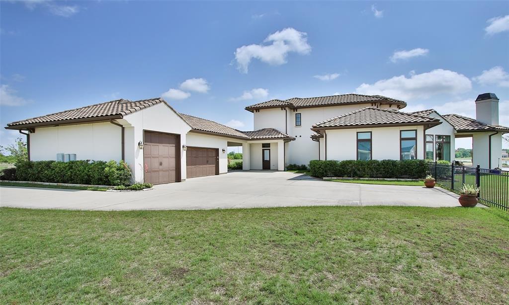 Incredible oversized 3 car garage with a circular driveway for ease of pulling in boat with trailer.  Double spaced driveway and porte cache means endless parking spaces.  Garage has coated floors with tons of top storage.