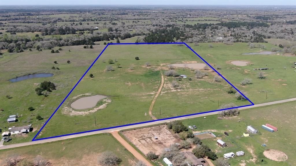 Conveniently located south of Bastrop off HWY 304, this +/- 33 acre tract is unrestricted and ready for new owners. The property boasts 2 nice size ponds and improved grasses, making this an ideal cattle or horse property. Aqua water is at the road Bluebonnet electric crosses the front of the property should the new owner wish to build their forever home. Currently under AG exemption, holding costs on this property are minimal. There is a small barn on the property with a small set of pens used to pen cattle. The property is in Smithville school district and does not feature any flood plain.