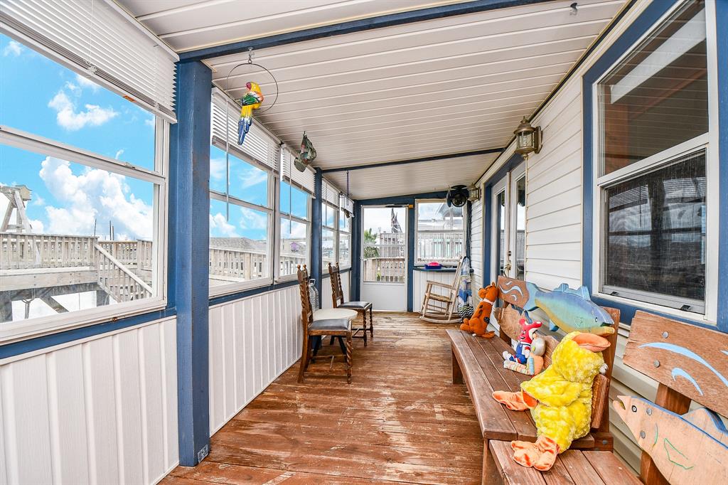 If the weather kicks up, you still have this amazing sunroom as your private front row seat to the elements and water views.