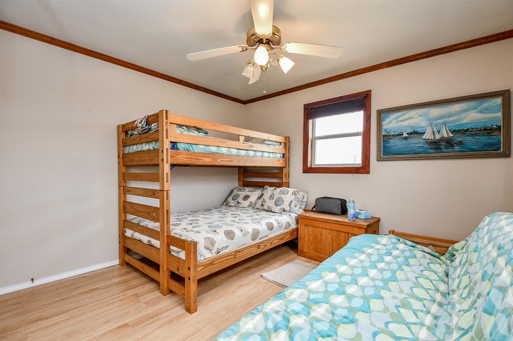 Any secondary bedroom may alternate purposes, besides offering a place to sleep. As suggested, there's enough space in this one for bedding (up and down) and/or a piece of lounging furniture.