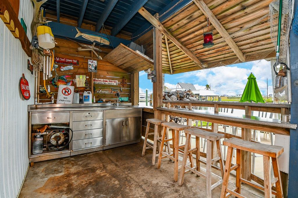 Outdoor kitchen equipment is just right for this waterfront patio bar.