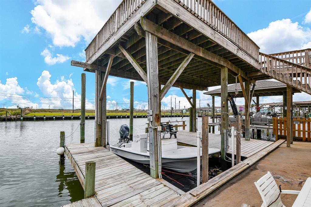 Two private boat slips sit just off the patio, for sailing jaunts to the Surfside Jetties and out into the Gulf, and yet a comfortable walking distance to the beach.