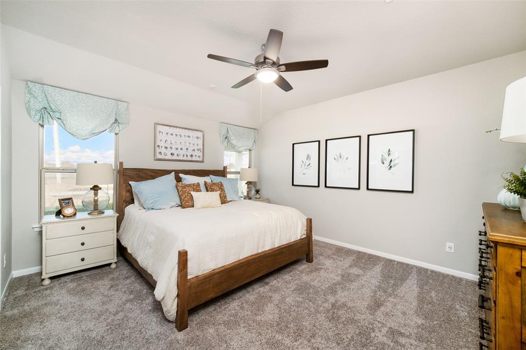 **Home is Under Construction. The photo shown here is of a completed home that has the same floor plan and similar elevation. Options and color selections may vary.**