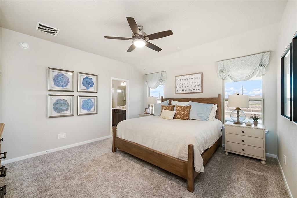 **Home is Under Construction. The photo shown here is of a completed home that has the same floor plan and similar elevation. Options and color selections may vary.**