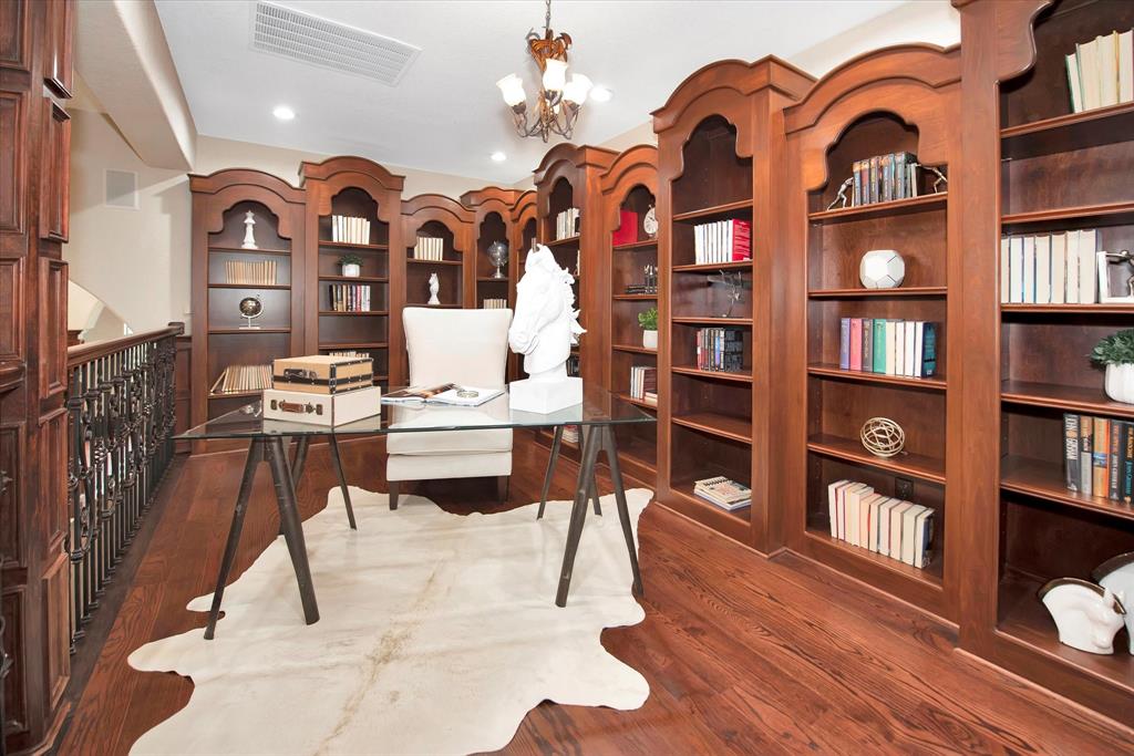 The library is right before you enter the living room.