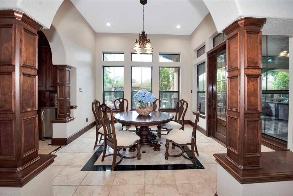 Breakfast area has a door that gives your access to the patio and outdoor kitchen.