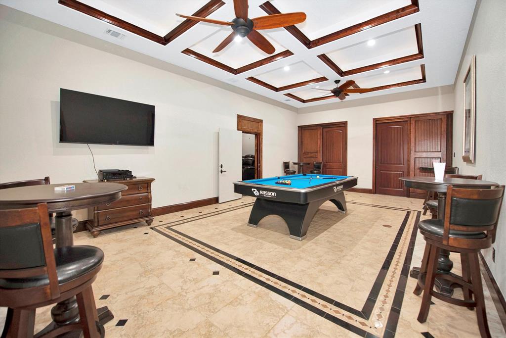 The gamroom/billiard room is perfect for entertaining guests.