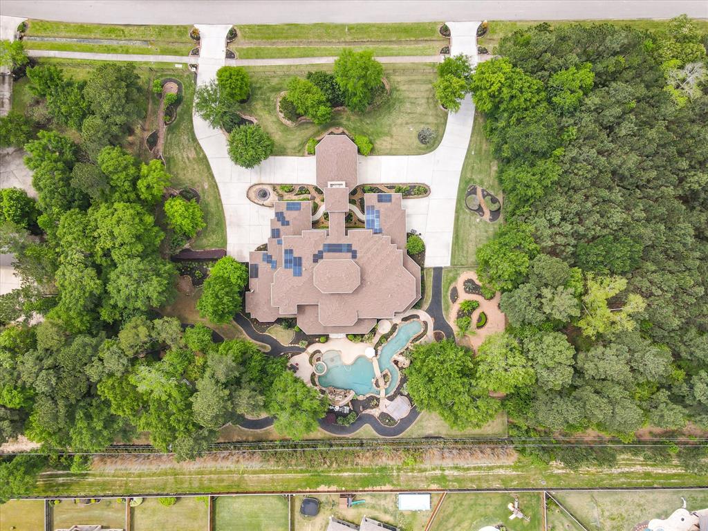 This beautiful property sits on over 2 acres with tons of amenities. It features a whole home generator, solar panels, water well for pool and sprinkler system, elevator and four car garage.