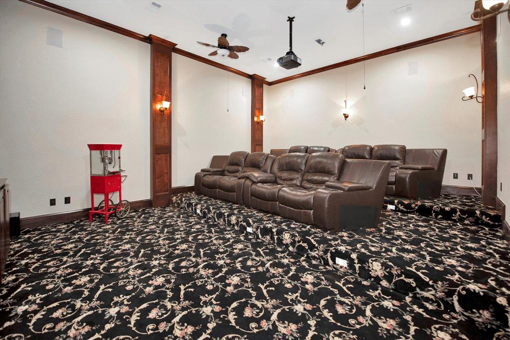 The media room is perfect for movie night and doubles as a secure Hurricane Room.