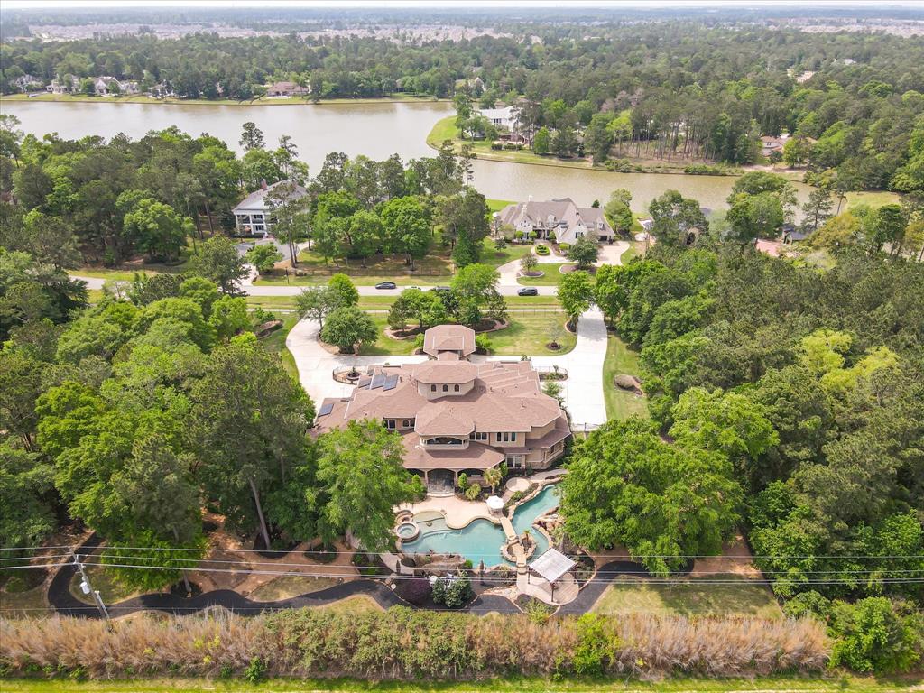 This beautiful property sits on over 2 acres with tons of amenities. It features a whole home generator, solar panels, water well for pool and sprinkler system, elevator and four car garage.