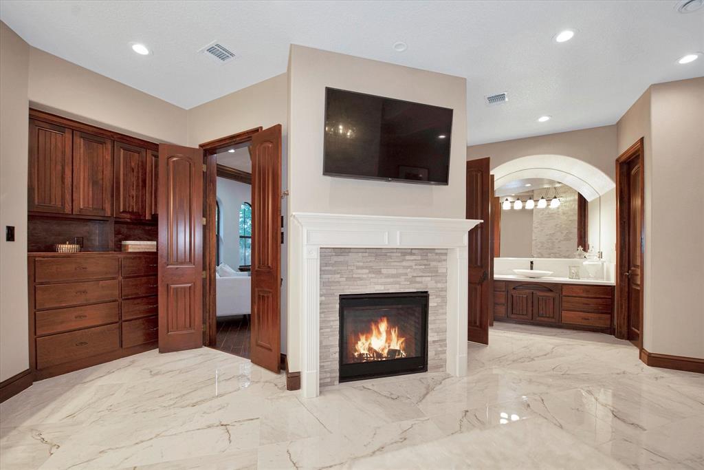 Fire place in primary bathroom.