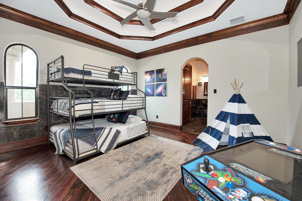 Every bedroom in this home has its own private bathroom and this particular bedroom also has private access to the balcony.
