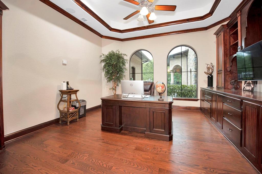Home office with tons of built in storage.