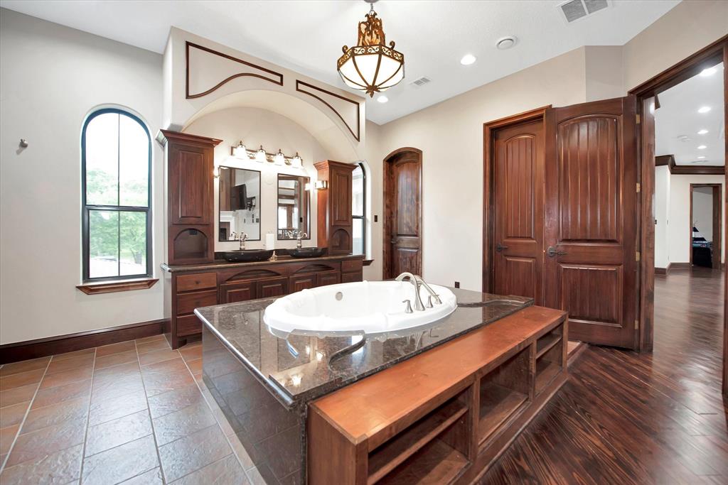 large soaking tub in secondary bedroom upstairs.