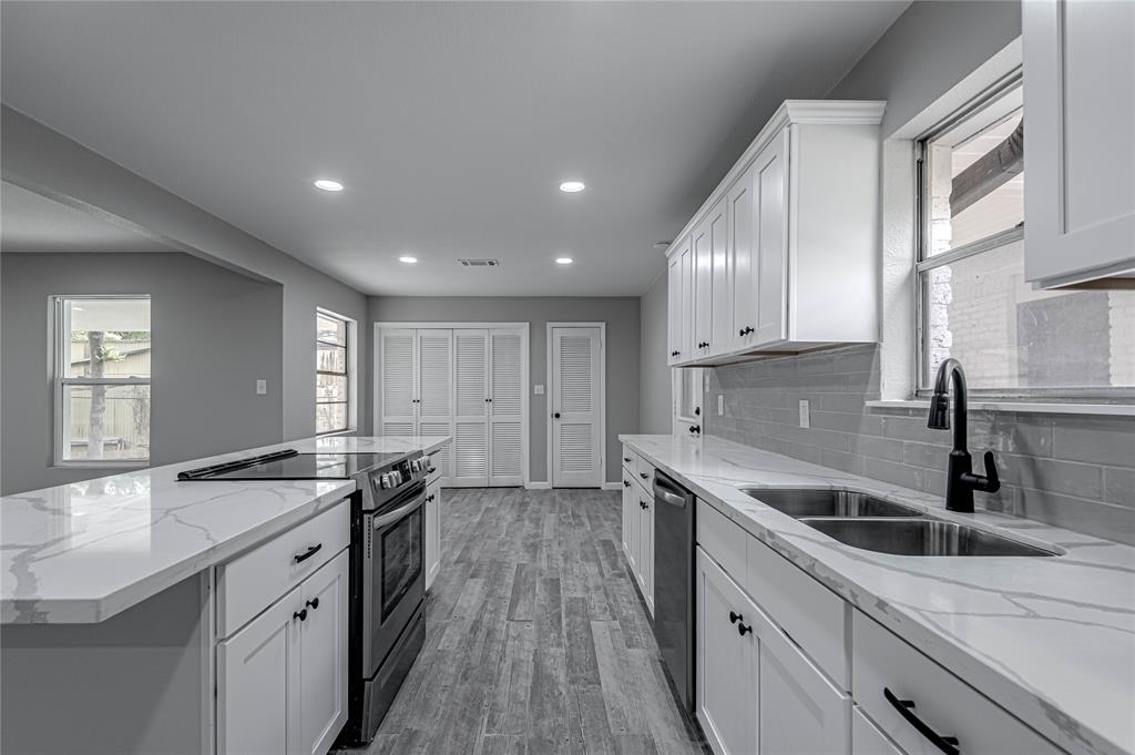 Updated appliances include a smooth-surface range.
