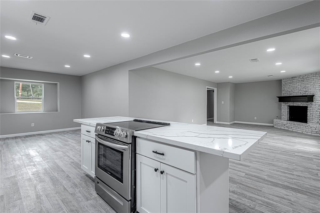 You'll never feel "left out" when in this kitchen.  It is open to both the Living Area and the Dining Area.