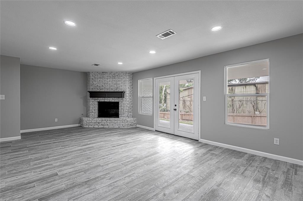 Seamless indoor-to-outdoor entertaining with this Living Room that opens onto a covered patio.