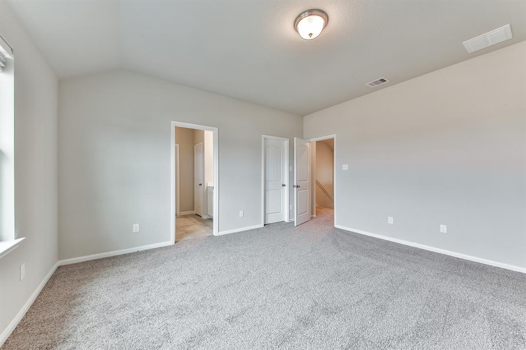 **Home is Under Construction. The photo shown here is of a completed home that has the same floor plan and similar elevation. Options and color selections may vary.**