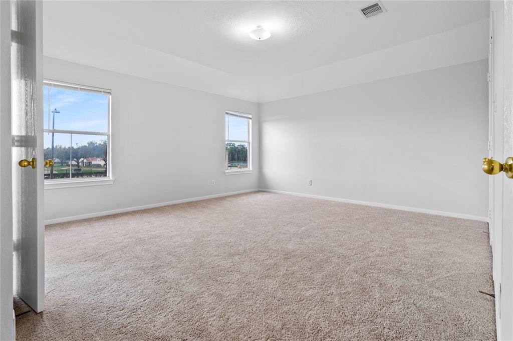 Master bedroom with view of the nearby lake