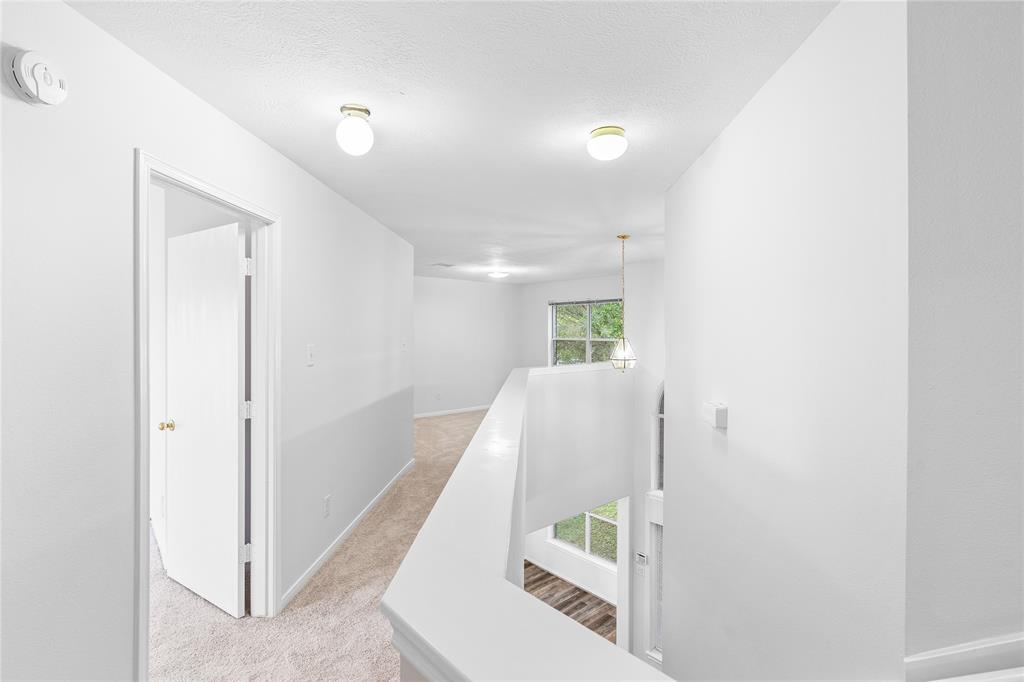 upstairs, facing the game room area.