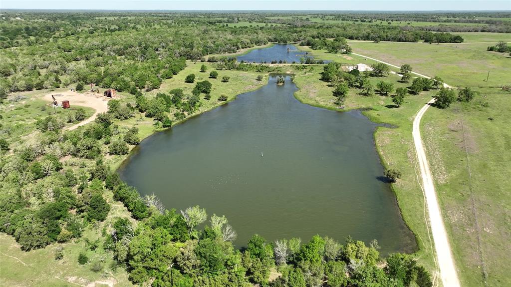 Incredibly rare find with 979.3 +/- picturesque acres in Lee County! This ranch offers year-round recreational enjoyment including stocked ponds for angling and optimal habitat for deer, ducks, hogs, or predators. The 8+ surface ponds that are spread throughout the property and Nails Creek that meanders throughout the middle add tons of character. What makes this ranch so unique is that it offers a variety of mixed-use habitats combining not only recreational enjoyment, but open pastures for cattle or horses, hunting and wildlife management opportunities, multiple water features, dense wooded areas, and unlimited building sites with dynamic views. Native and improved grasses are prevalent throughout. The soil primarily consists of clay and sandy soil. There is a metal building near the two largest ponds that includes a garage/storage area. No minerals. Ag Exemption. If you're looking for a legacy ranch with unlimited potential and enjoyment, you won't want to miss this one!