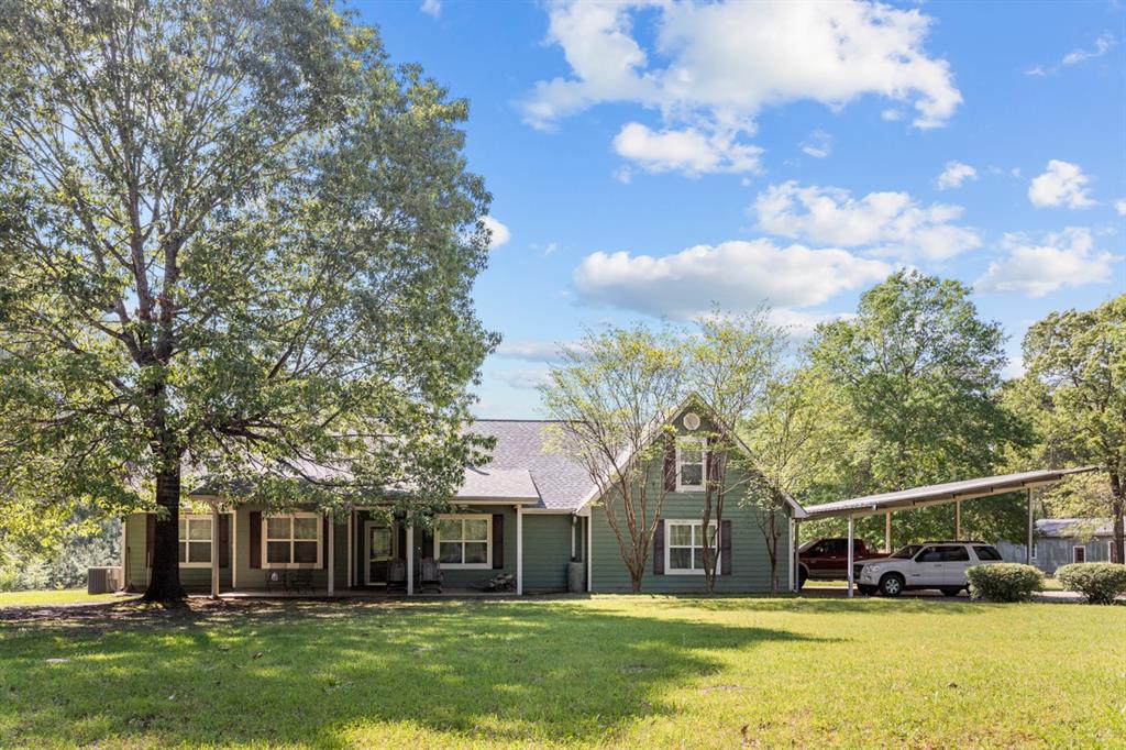 Country Victorian 4BD/3BA home on 20.35acres w/a shop every man would love. BONUS; its Neches ISD! Raised Ceilings & well-appointed kitchen featuring commercial grade double ovens & frig, ample counter space, cement topped island, walk in pantry & custom cabinetry. Other features are the tankless water htr w/filter system, 2x6 walls,r19 insulation ,new roof (2022) and 40panel 300w solar panes for low bills! In back is a covered patio/screened in sunroom area which overlooks the double tiered deck & pond. 2 car attached garage & 3 car carport w/two garage bays in the 1500sqft (already wired w/electric,3-area)workshop. Private Well& additional shared well for convenience. Property offers 2 ponds & is fenced completely w/field wire! Must See!