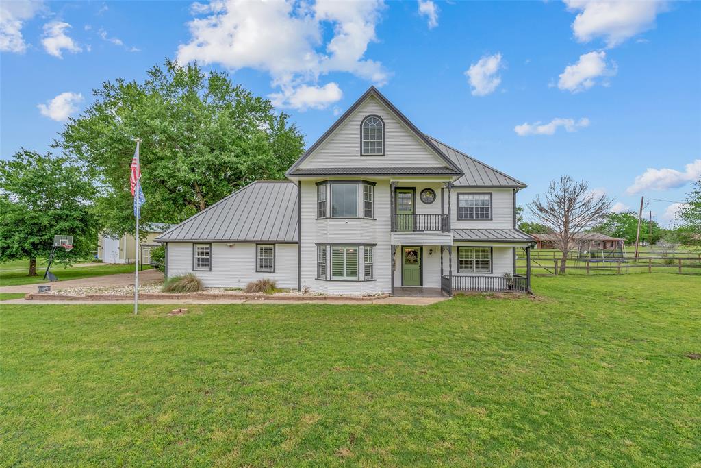 1985 Eastridge Lane Madisonville, Texas Victorian style country home is a must see! It is conveniently located and close to all amenities! Take a short drive to Main Street for great food and entertainment, just under 2 miles from I-45 and 97 miles to Houston. This beautiful home sits in the middle of Eastridge edition on 3.3 acres and well know for family living. Outside offers a detached two-car garage and two-car carport, and beside the garage is a 800 sqft barn for RV storage or a shop for all toys. Behind the house is fenced for horses or 4-H projects. Enjoy the pool for all those hot summer days and entertain friends and family. This 2868 sqft home offers 5 bedrooms and 3.5 baths. The primary bedroom is on the first floor, with a huge walk-in closet, private bathroom with soaking tub and stand-up shower. The family dining, private office, large living room with built-in electric heater and large kitchen with breakfast bar. Upstairs is spacious with 4 bedrooms and two full baths. Come see this beautiful home!