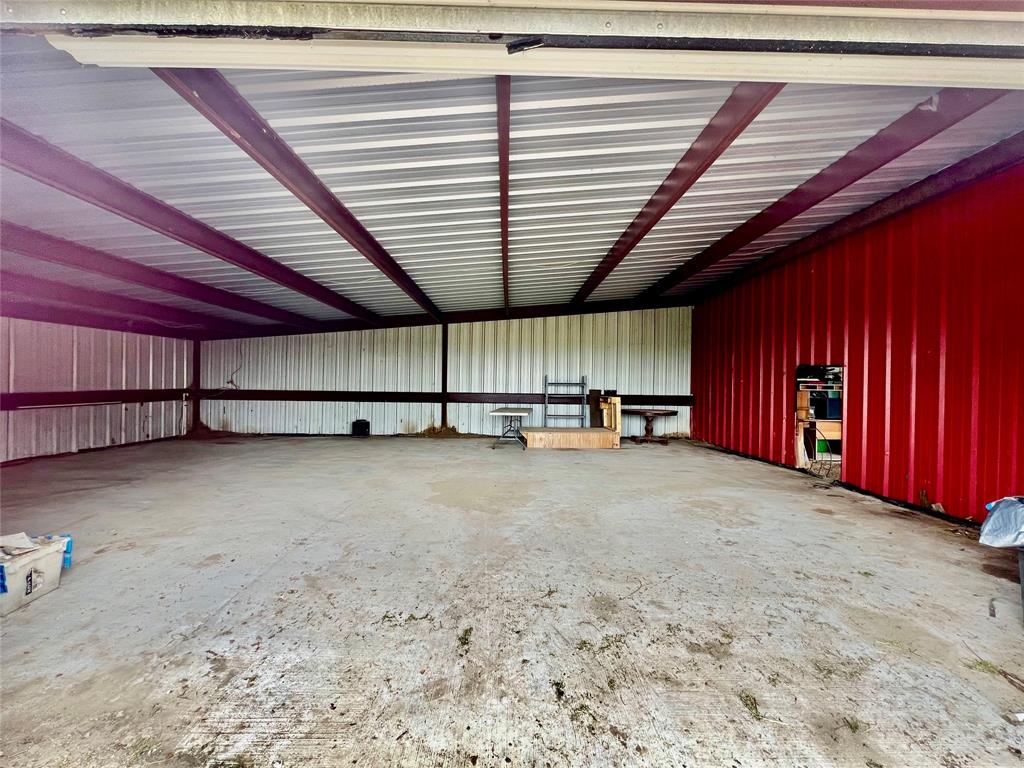 Shop interior with concrete floor.