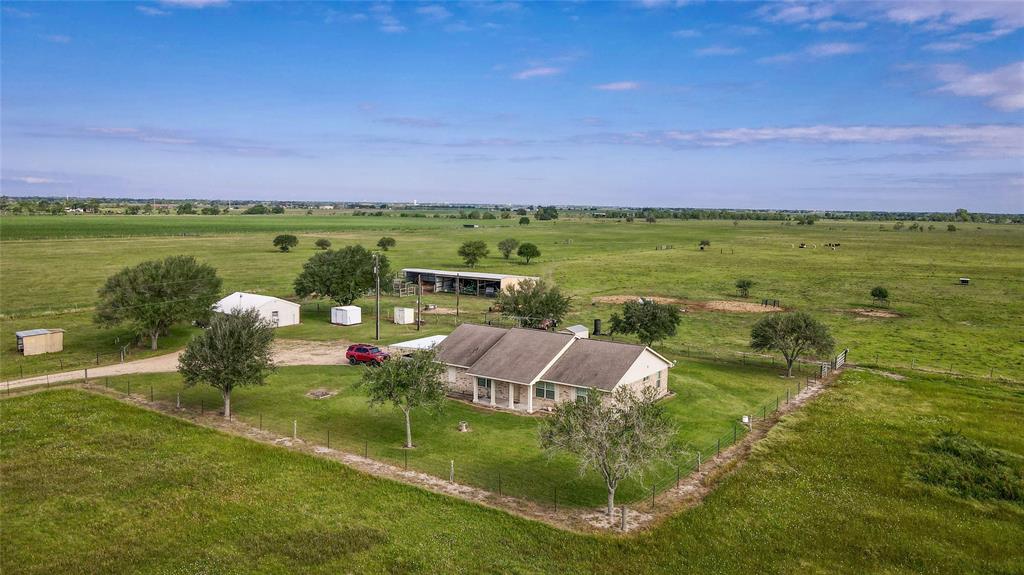 TURNKEY CATTLE RANCH - Great opportunity to own very well maintained 2 bedroom, 2 bath home on improved  40 acre pasture. Good perimeter fencing and cross fencing. Underground piping and troughs to supply water to cattle and good cattle working pens. 3 side equipment barn. Additional 676 sq. ft. guest quarters.