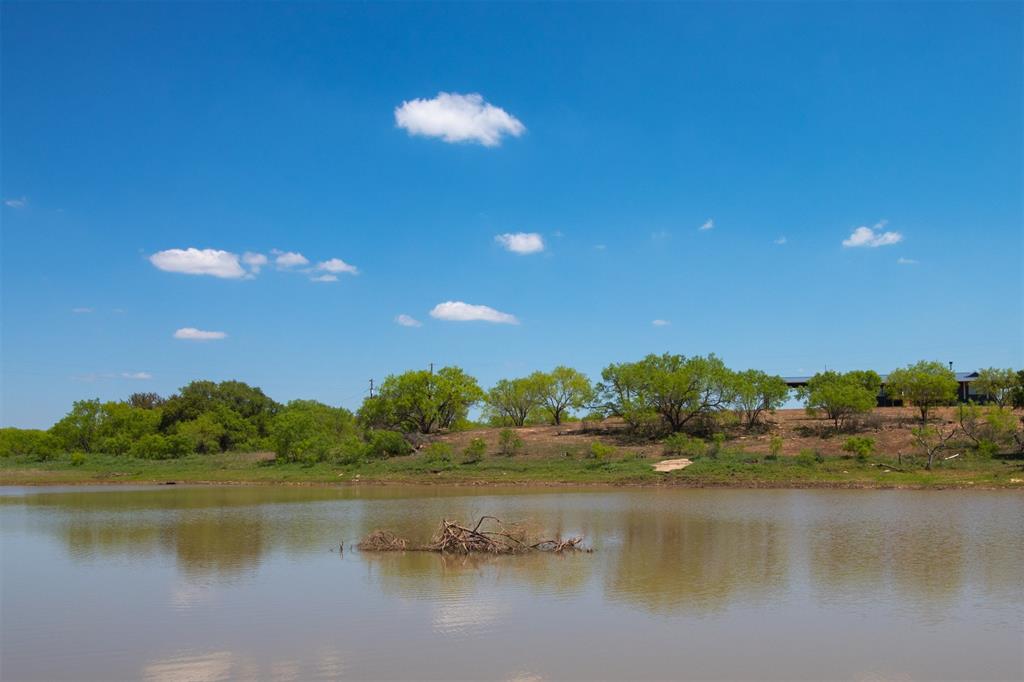 The central lake makes this ranch unique to other dry Hill Country ranches.