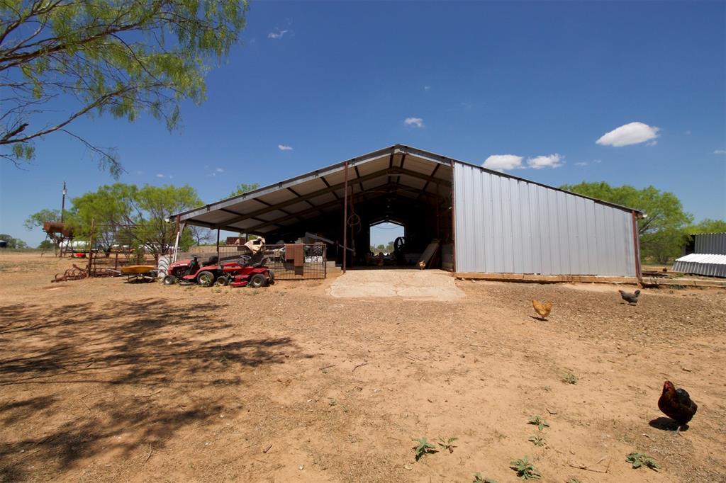Back view of the barn and storage area.