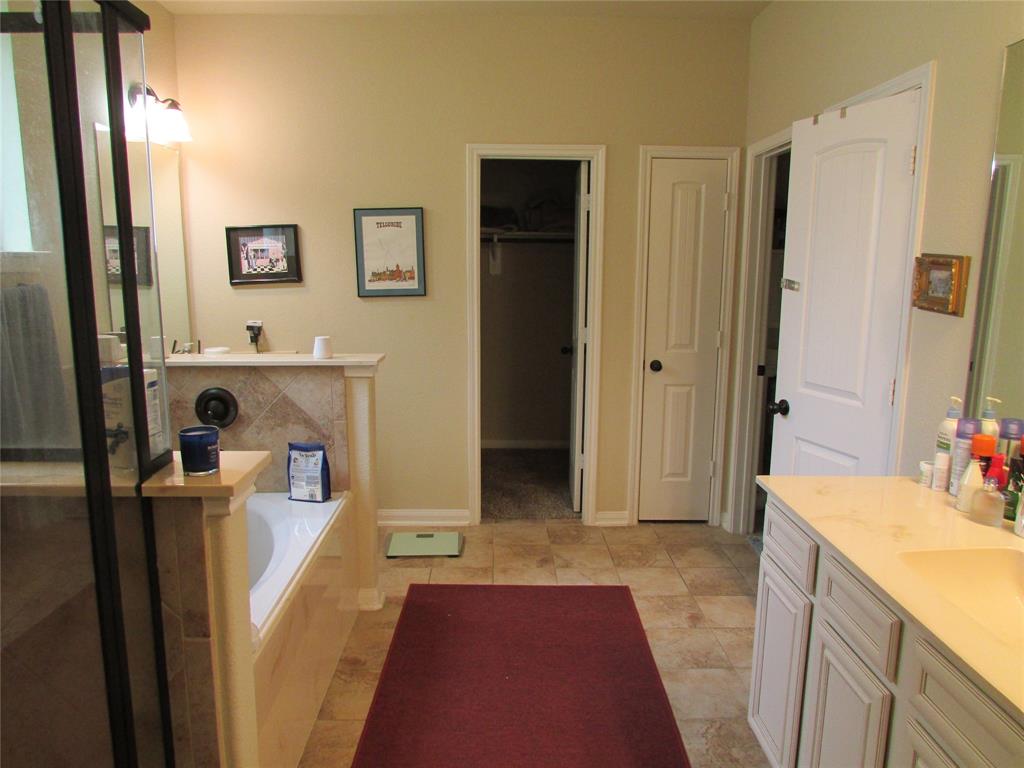 Primary Bath has His & Her Walk-in Closets
