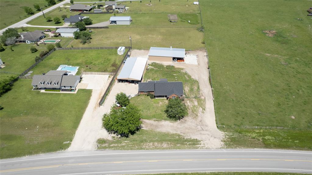 3 bedroom, 2 bath home located on 1 acre in Kurten. The property features two 2,000 sq. ft metal buildings. No restrictions. Seller will consider selling some of the auto shop equipment.