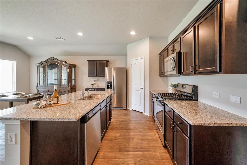 spacious kitchen island with sink.