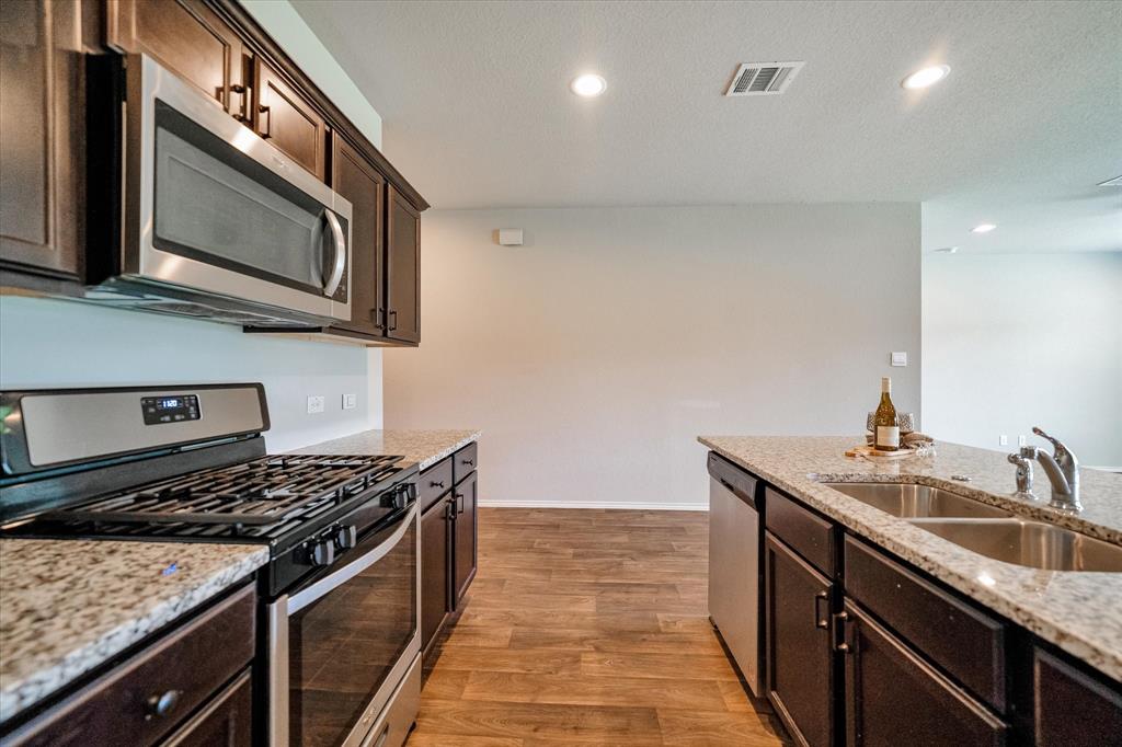 Home is equipped with high-end stainless-steel appliances.