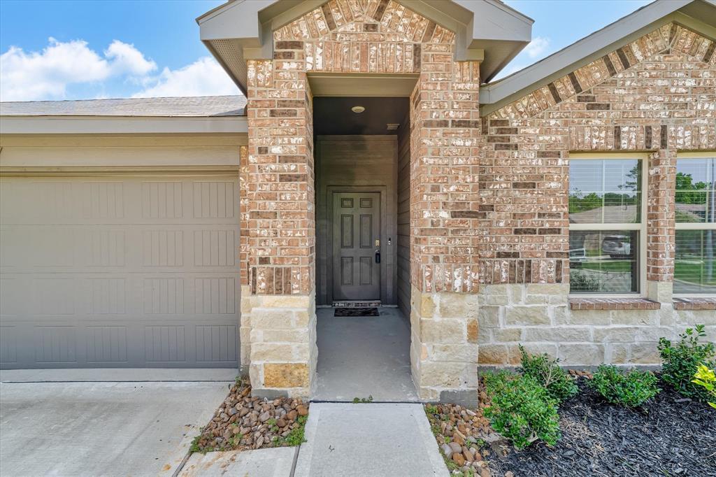 Upgraded brick and stone elevation.