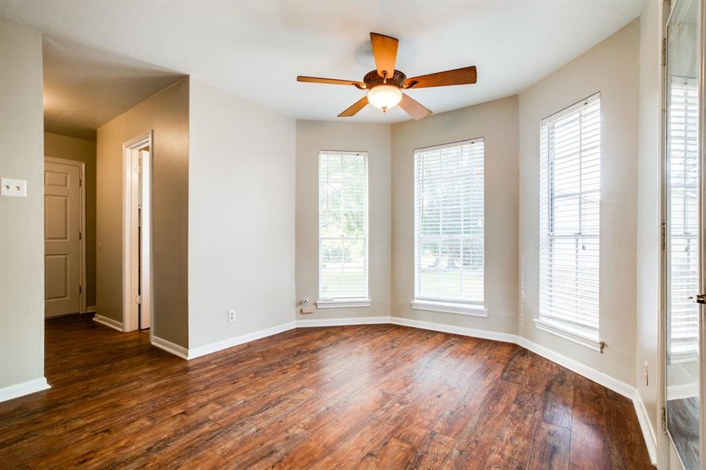 Breakfast Room to half-bath and garage view.