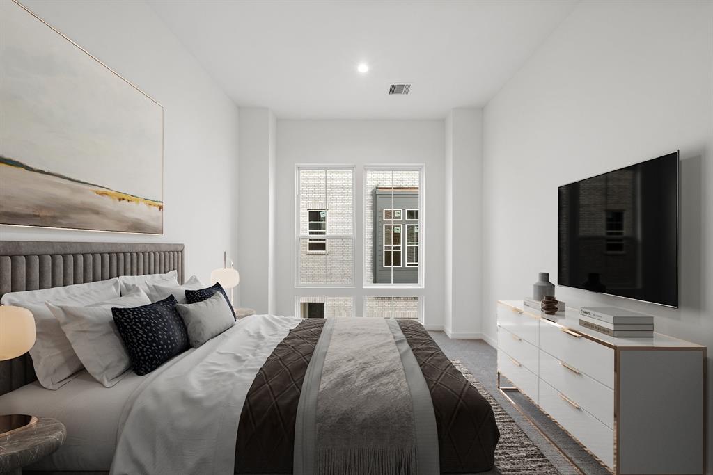 Wake up to bright and refreshing mornings in the spacious secondary bedroom, offering plenty of room to personalize or transform into a guest suite.